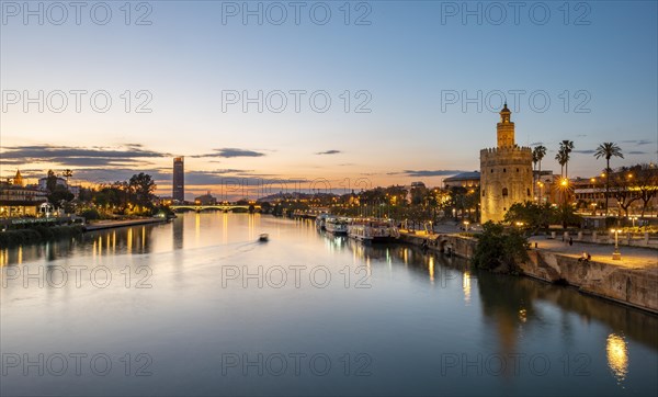 View over the river Rio Guadalquivir with Torre del Oro