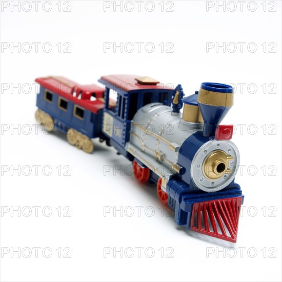 Locomotive toy on white background