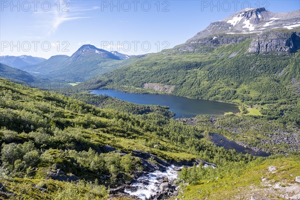 Waterfall flows into the Innerdalen high valley