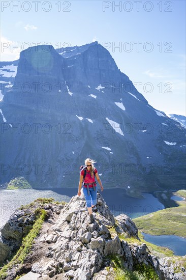 Hiker on the way to Innerdalstarnet