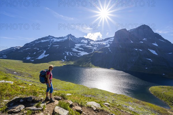 Hiker on the way to Innerdalstarnet