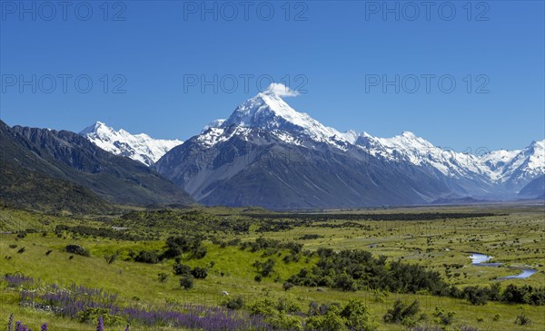 View of Mount Cook and snow covered mountains with Tasman River