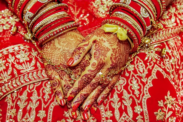 Close up of mehendi on bride's hand