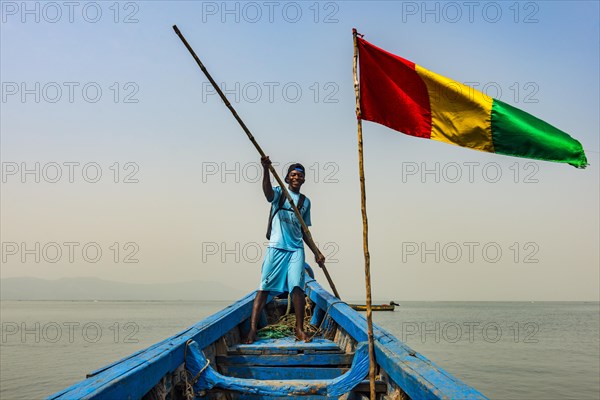 Guinean flag on a boat