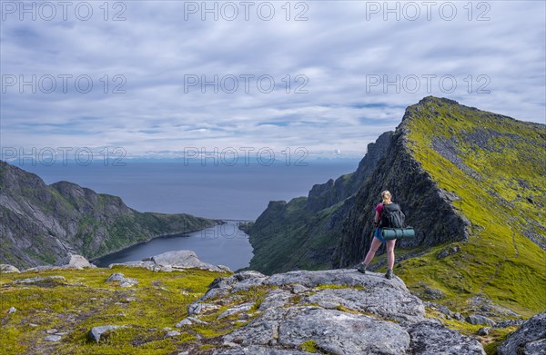 Hiker looks out over the Djupfjords