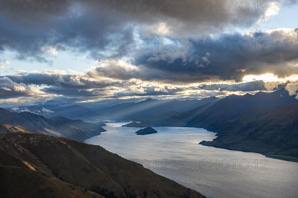 Sunbeams shining through cloudy sky