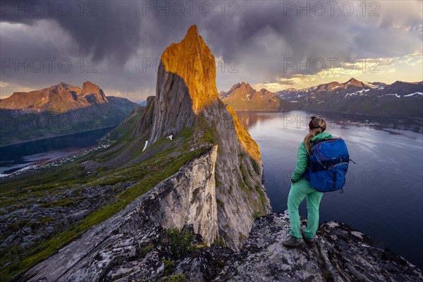 Hiker looks at landscape