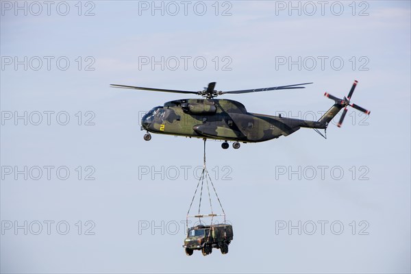 Bundeswehr helicopter with a truck