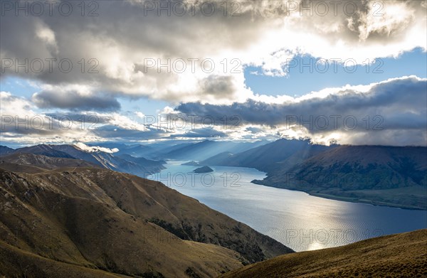 Sunbeams shining through cloudy sky