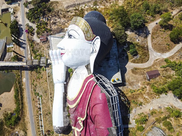 Aerial of a giant reclining buddha in Win Sein Taw Ya outside Mawlamyine