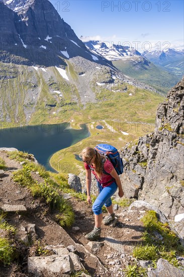 Hiking on a steep trail to Innerdalstarnet