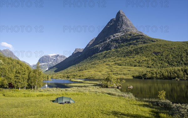 Tent on camping site by the lake Litlvatnet in the high valley Innerdalen