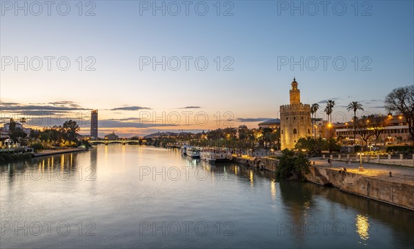 View over the river Rio Guadalquivir with Torre del Oro