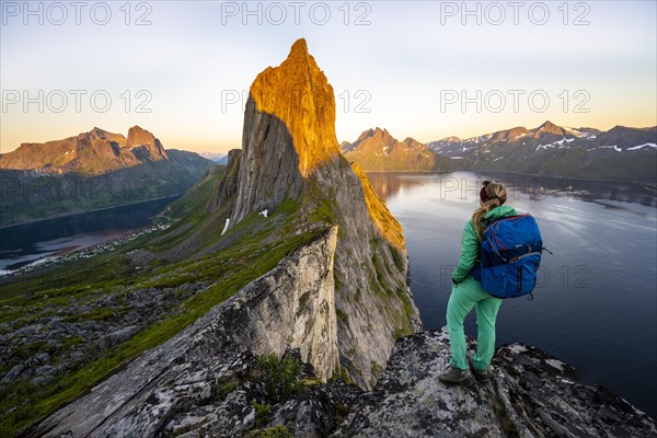 Hiker looks at landscape