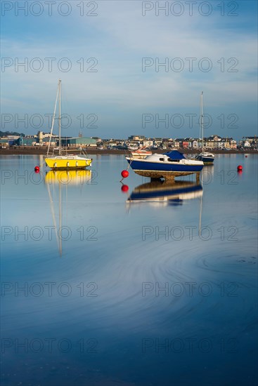 Long time exposure of boats in low tide