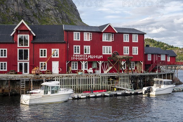 Traditional red stilt houses