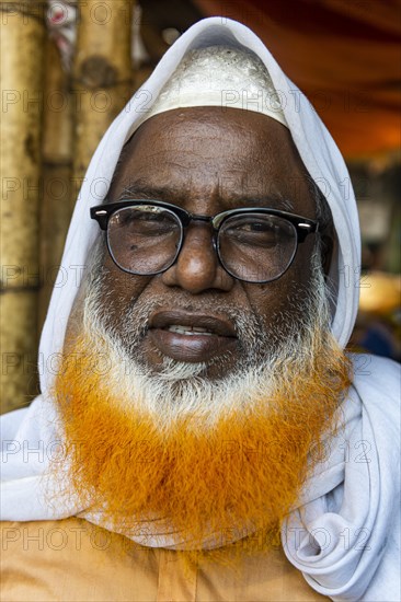 Man with coloured beard