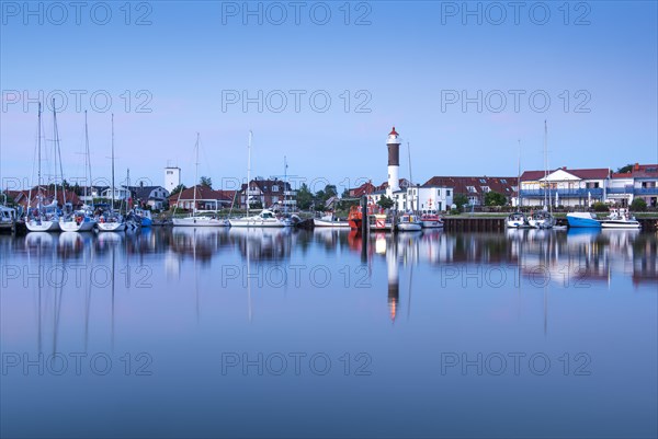 Timmendorf harbour with lighthouse in the evening