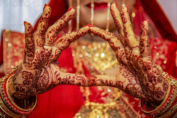 Close up of mehendi on bride's hand