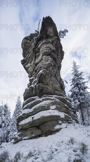 Rock formation Kreuzfelsen with snow in winter