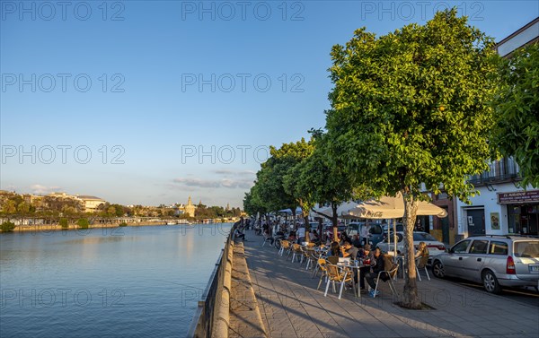 Waterfront promenade on Calle Betis in Triana with the river Rio Guadalquivir