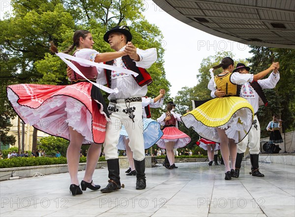 Dance performance of a folklore group in Mestsky Park