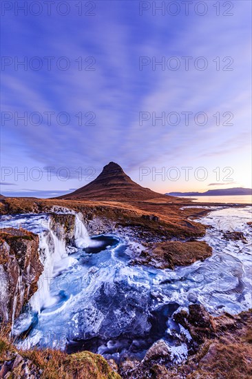 Morning atmosphere at Kirkjufell with waterfall Kirkjufellsfoss