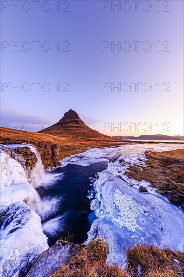 Morning atmosphere at Kirkjufell with waterfall Kirkjufellsfoss