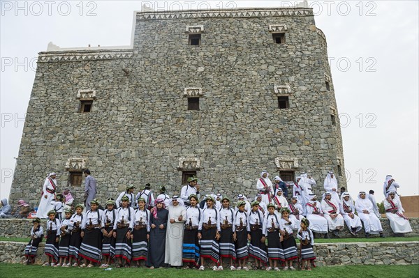 Colourful dressed traditional men