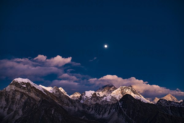 View in the moonlight from Renjo La Pass 5417 m to the east on Himalaya with Mount Everest