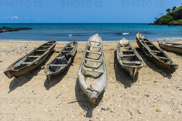 Wooden fishing boats in the fishing village Morro Peixe in northern Sao Tome