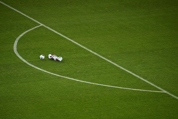 Adidas Derbystar match balls lie on grass