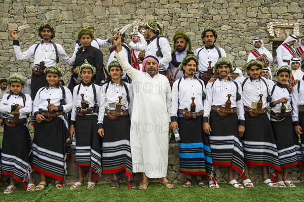 Colourful dressed traditional men