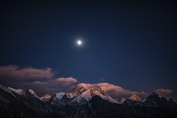 View in the moonlight from Renjo La Pass 5417 m to the east on Himalaya with Mount Everest