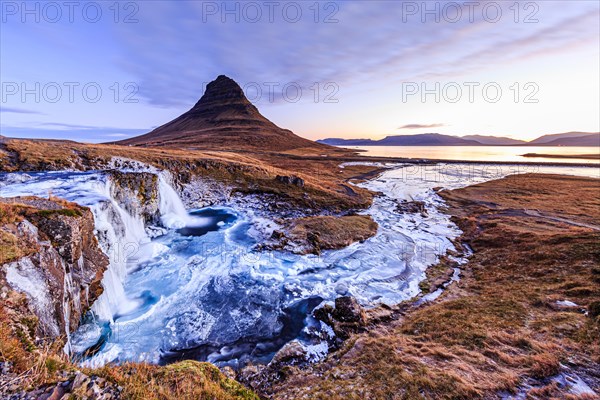 Morning atmosphere at Kirkjufell with waterfall Kirkjufellsfoss