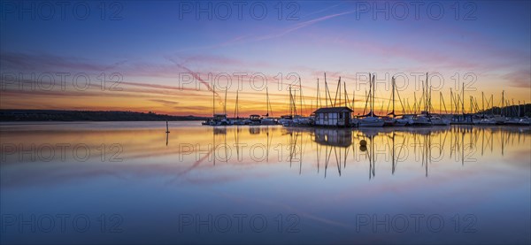 Sailing boats at sunrise