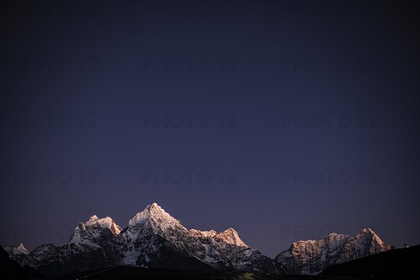 View at Namche Bazar in the evening light on Kangtega