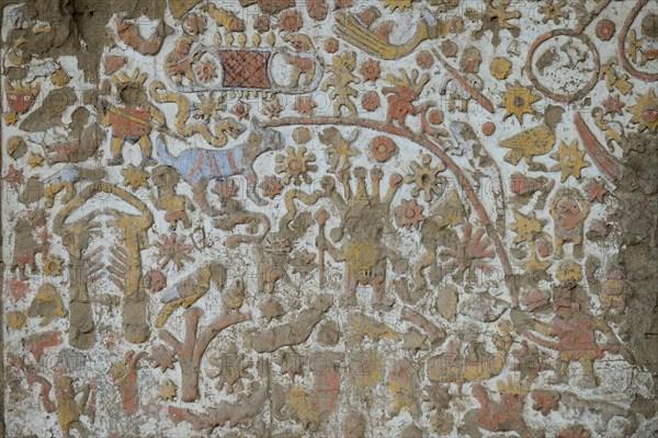 Colourful reliefs of the Moche culture on adobe walls