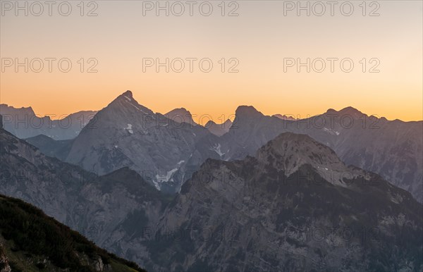 Sunset behind mountain silhouette