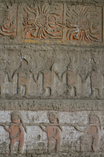 Colourful reliefs of the Moche culture on adobe walls