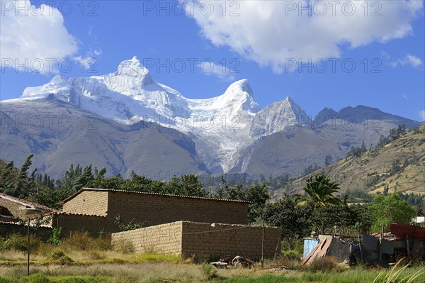 Farm at the foot of the mountain Nevado Huandoy