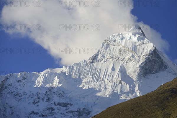 Summit of Nevado Huandoy with cloud