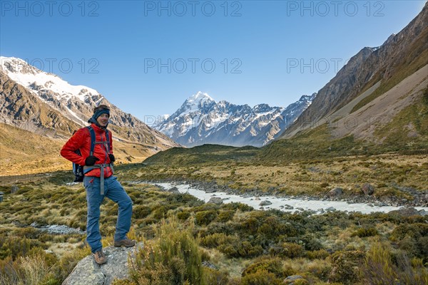 Hiker standing on a rock