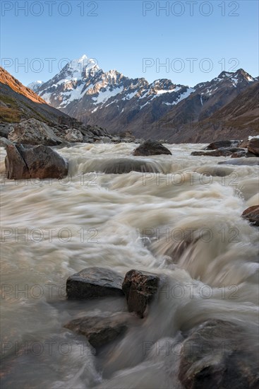 Hooker River in Hooker Valley with view of snow-capped Mount Cook