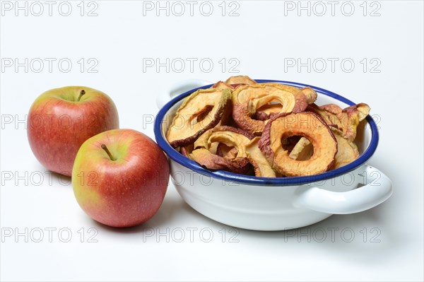 Dried apple rings in skin and apples