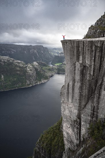 Single person on rock plateau