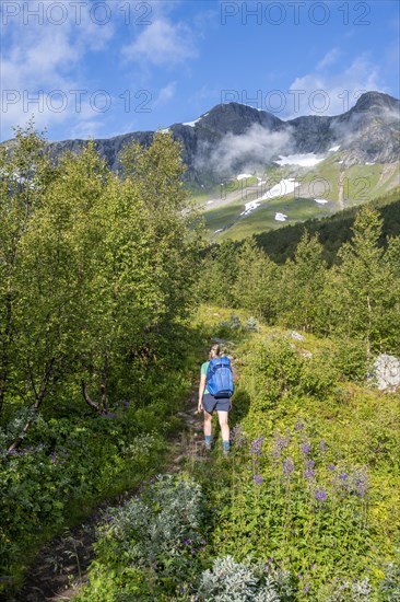 Young hiker on hiking trail