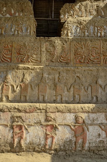 Colourful reliefs of the Moche culture on adobe walls