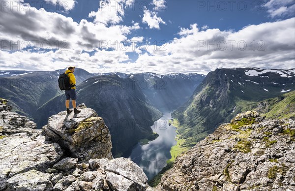 Hiker standing on rocks