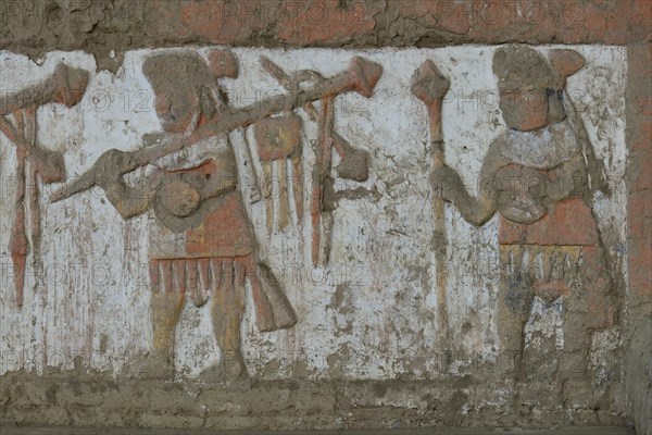 Colourful reliefs of the Moche culture on adobe walls